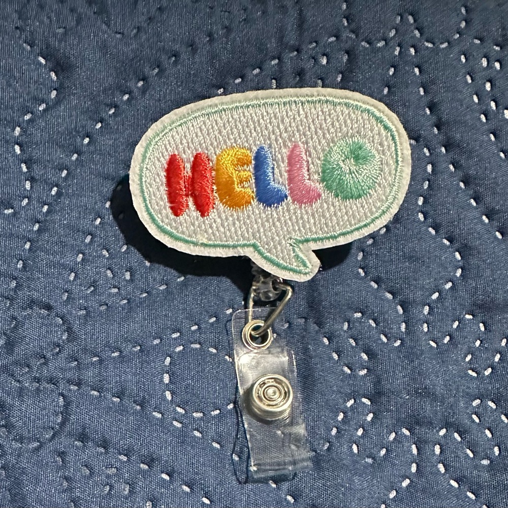 Colorful 'Hello' Speech Bubble Badge Reel